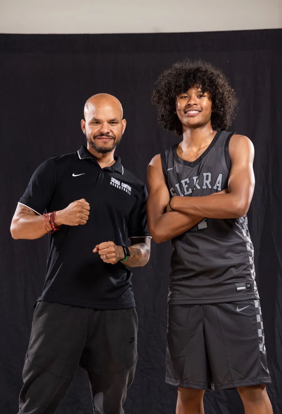 Coach Sandy with a Sierra Canyon player in studio portrait